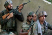 Militant surrenders during encounter with forces in Shopian